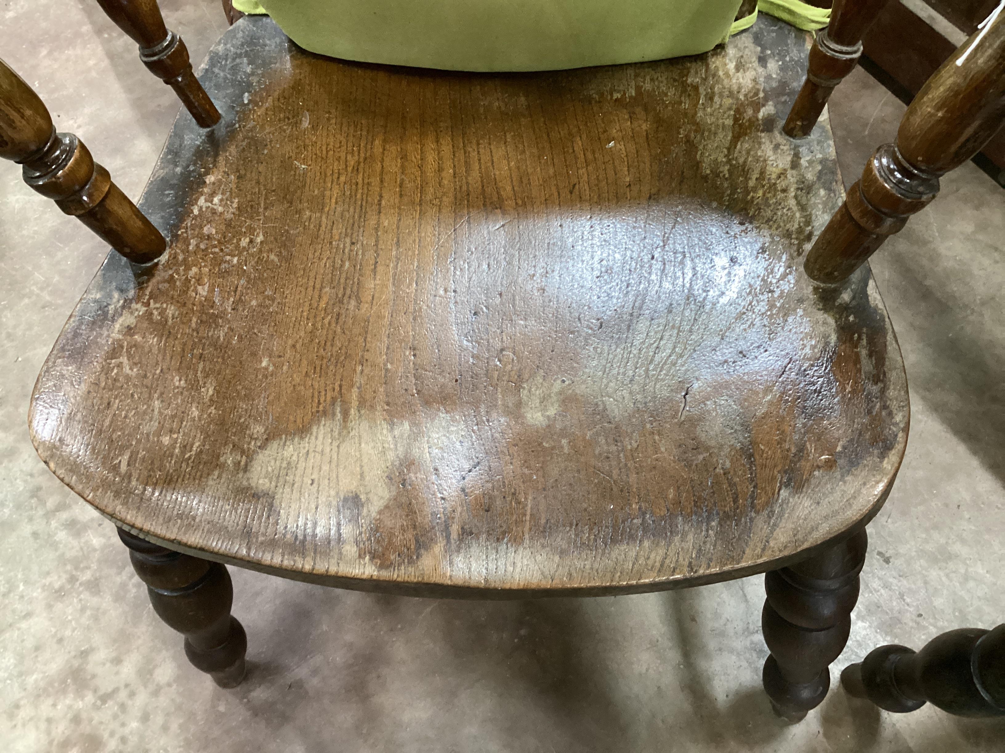 A near pair of late Victorian elm and beech Windsor smoker's bow chairs, width 69cm, depth 50cm, height 80cm
